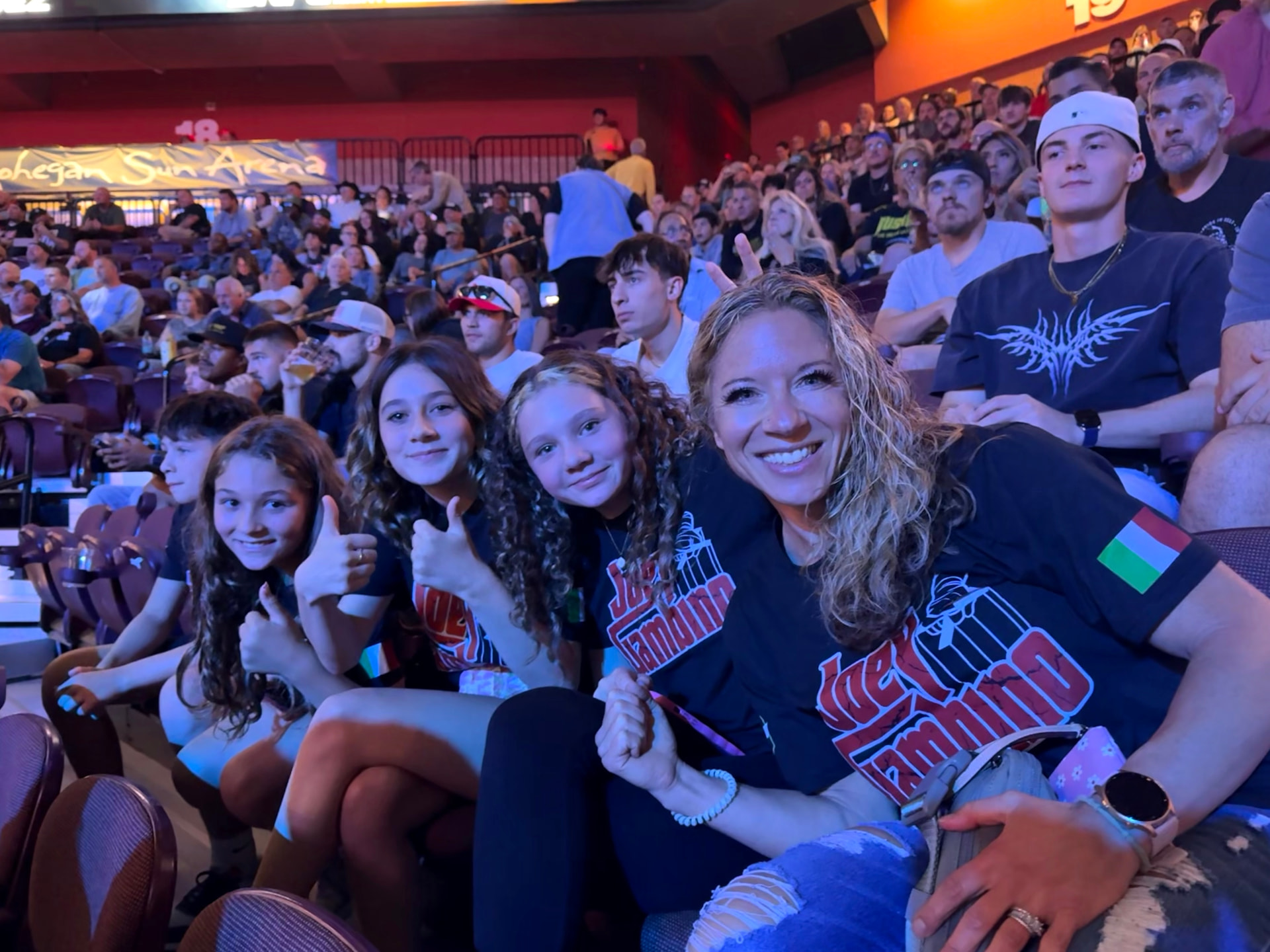 Joey Gambino's family in the crowd wearing Joey Gambino shirts