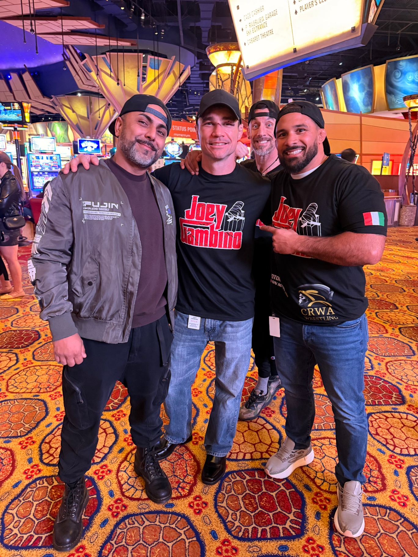 Joey Gambino posing with Dennis Bermudez and PetrolWerks crew at Mohegan Sun