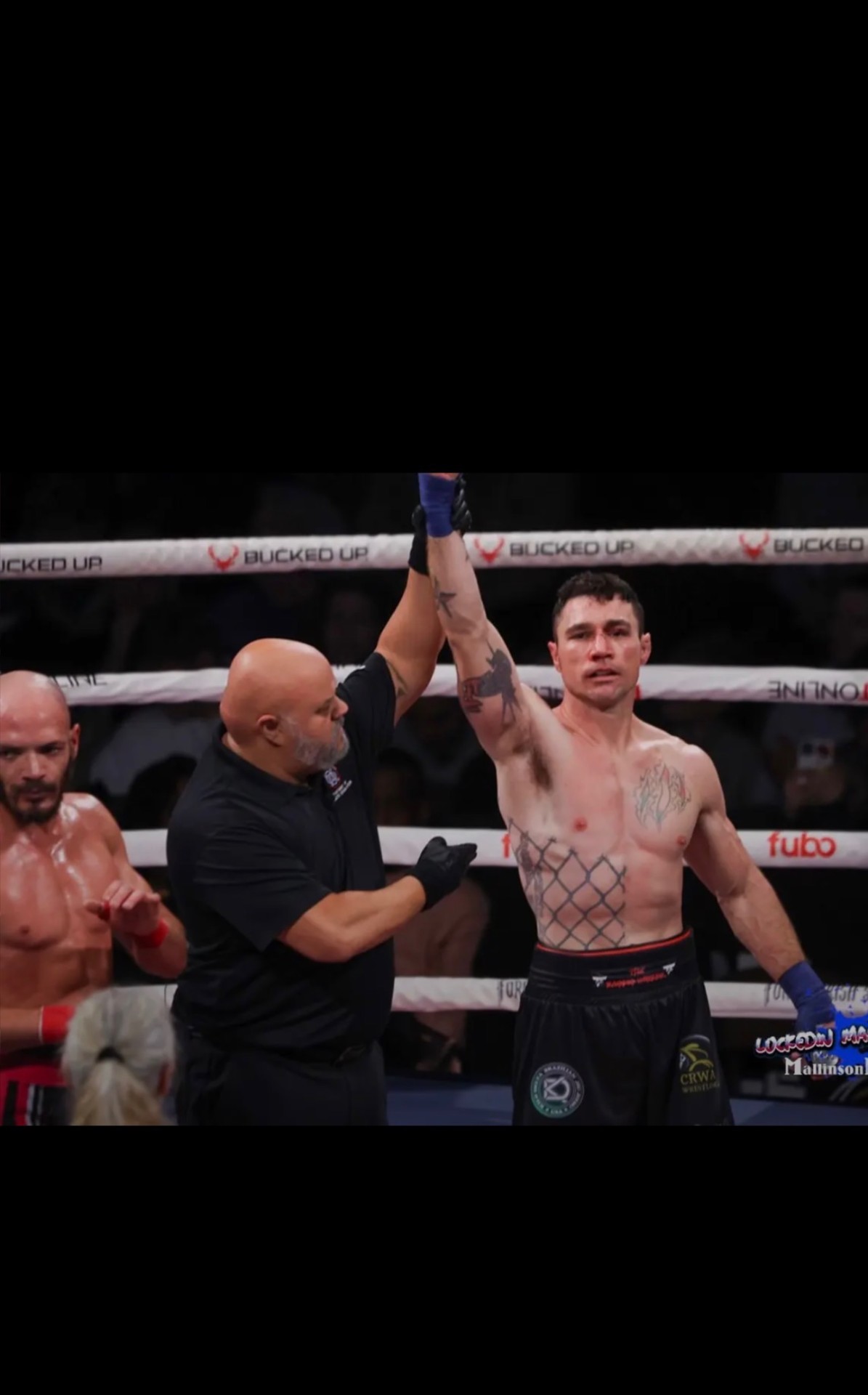 Joey Gambino's hand raised by the referee after winning at BKFC 86